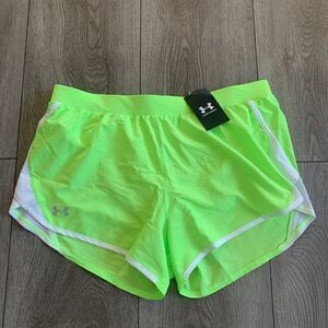 Under Armour woman’s loose fit shorts with underwear lining
